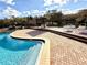 Resort-style pool and deck area at 1400 Tarpon Woods Blvd # H6, Palm Harbor, FL 34685
