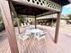 Poolside seating under gazebo at 1400 Tarpon Woods Blvd # H6, Palm Harbor, FL 34685