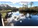 Scenic view of a calm river reflecting the sky at 1400 Tarpon Woods Blvd # H6, Palm Harbor, FL 34685