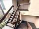 Exterior condo building staircase with metal railings at 1400 Tarpon Woods Blvd # H6, Palm Harbor, FL 34685