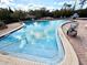 Inviting community swimming pool at 1400 Tarpon Woods Blvd # H6, Palm Harbor, FL 34685