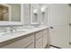 Elegant bathroom with double vanity, quartz countertop, and updated fixtures at 16403 Zurraquin De Avila, Tampa, FL 33613