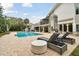 Inviting swimming pool with spacious patio and lounge chairs at 16403 Zurraquin De Avila, Tampa, FL 33613