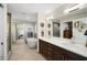 Double vanity bathroom with a large soaking tub and separate shower at 199 Dali Blvd # 407, St Petersburg, FL 33701