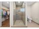Modern bathroom with a walk-in shower, toilet and access to a walk-in closet at 199 Dali Blvd # 407, St Petersburg, FL 33701