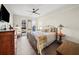 Spacious bedroom with hardwood floors and ceiling fan at 199 Dali Blvd # 407, St Petersburg, FL 33701