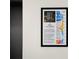 Informative framed image describing the building's 11-story art mural at 199 Dali Blvd # 407, St Petersburg, FL 33701