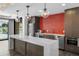 Modern community kitchen with stainless steel appliances and a stylish backsplash at 199 Dali Blvd # 407, St Petersburg, FL 33701
