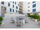 Community fire pit and seating area for residents at 199 Dali Blvd # 407, St Petersburg, FL 33701