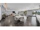 Open concept community room featuring multiple seating areas and large windows at 199 Dali Blvd # 407, St Petersburg, FL 33701