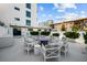 Community fire pit surrounded by comfortable seating at 199 Dali Blvd # 407, St Petersburg, FL 33701