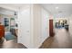 Bright hallway with wood floors and access to bedroom and dining area at 199 Dali Blvd # 407, St Petersburg, FL 33701