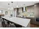 Modern kitchen with stainless steel appliances and a large island at 199 Dali Blvd # 407, St Petersburg, FL 33701
