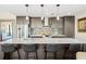 Modern kitchen with stainless steel appliances and stylish backsplash at 199 Dali Blvd # 407, St Petersburg, FL 33701