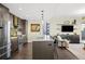 Modern kitchen with large island and stainless steel appliances at 199 Dali Blvd # 407, St Petersburg, FL 33701