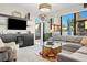 Relaxing living room with comfortable seating and a modern entertainment center at 199 Dali Blvd # 407, St Petersburg, FL 33701
