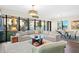 Spacious living room with large windows, offering ample natural light and city views at 199 Dali Blvd # 407, St Petersburg, FL 33701