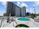 Relaxing pool and spa area with lounge chairs and modern design at 199 Dali Blvd # 407, St Petersburg, FL 33701