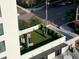 Shared rooftop deck with artificial turf, seating, and sculptures at 199 Dali Blvd # 407, St Petersburg, FL 33701