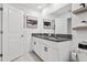 Bathroom with double vanity and granite countertops at 21428 Darter Rd, Land O Lakes, FL 34638