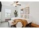 Bright bedroom with a king-size bed and neutral color scheme at 21428 Darter Rd, Land O Lakes, FL 34638