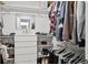Walk-in closet with shelving and hanging rods at 21428 Darter Rd, Land O Lakes, FL 34638
