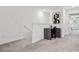 Upstairs study area with a built-in desk and neutral decor at 21428 Darter Rd, Land O Lakes, FL 34638