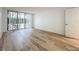 Bedroom with sliding doors to private patio at 220 Belleview Blvd # 101, Belleair, FL 33756
