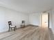 Large bedroom with wood flooring and access to a bathroom at 220 Belleview Blvd # 101, Belleair, FL 33756