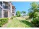 Condo with screened balcony overlooking lush lawn and lake at 2400 Feather Sound Dr # 1418, Clearwater, FL 33762