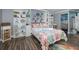 Bedroom with built-in shelves and ocean-themed decor at 2621 Cove Cay Dr # 205, Clearwater, FL 33760