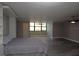 Open concept bedroom features durable wood-look flooring, ceiling fan and built-in shelving at 2621 Cove Cay Dr # 205, Clearwater, FL 33760