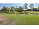 Lush green golf course with walking path at 2621 Cove Cay Dr # 205, Clearwater, FL 33760