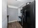 Modern kitchen with black appliances and granite countertops at 2621 Cove Cay Dr # 205, Clearwater, FL 33760