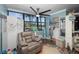 Small laundry room with stacked washer and dryer at 2621 Cove Cay Dr # 205, Clearwater, FL 33760