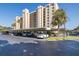 Condominium building with covered parking and ample spaces for residents at 2621 Cove Cay Dr # 205, Clearwater, FL 33760