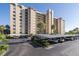 Condominium building with covered parking and ample spaces for residents at 2621 Cove Cay Dr # 205, Clearwater, FL 33760