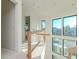 Open hallway with modern windows and wooden railing at 2622 N Dundee St, Tampa, FL 33629