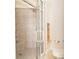 Bathroom with a large shower and tiled floors at 301 Midway Is, Clearwater Beach, FL 33767