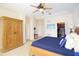 Large main bedroom with a king-size bed and walk-in closet at 301 Midway Is, Clearwater Beach, FL 33767