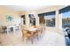 Dining room with water views and seating for six at 301 Midway Is, Clearwater Beach, FL 33767