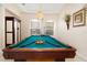 Game room with pool table and ample space at 301 Midway Is, Clearwater Beach, FL 33767