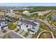Stunning coastal community featuring multi-story residences, lush landscaping, and waterfront access at 3027 Bermuda Sloop Cir, Ruskin, FL 33570