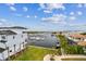 Stunning aerial view showcases the waterfront homes and marina, a picturesque coastal community at 3027 Bermuda Sloop Cir, Ruskin, FL 33570