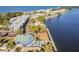 Aerial view of a waterfront property, showcasing the building's layout and beautiful water access and amenities at 3027 Bermuda Sloop Cir, Ruskin, FL 33570