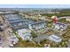 Stunning aerial view of luxury waterfront townhomes with marina access, offering a picturesque coastal lifestyle at 3027 Bermuda Sloop Cir, Ruskin, FL 33570