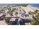 Aerial view of Sunset Grill, showcasing beach access, and a dining establishment with waterfront views at 3027 Bermuda Sloop Cir, Ruskin, FL 33570