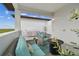 Inviting outdoor patio with stylish furniture, ideal for relaxation and enjoying serene surroundings at 3027 Bermuda Sloop Cir, Ruskin, FL 33570
