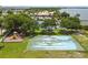 Recreational area featuring a basketball court and playground, ideal for outdoor fun and community engagement at 3027 Bermuda Sloop Cir, Ruskin, FL 33570