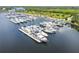 Scenic marina view with boats docked in the calm waters, perfect for boating enthusiasts at 3027 Bermuda Sloop Cir, Ruskin, FL 33570